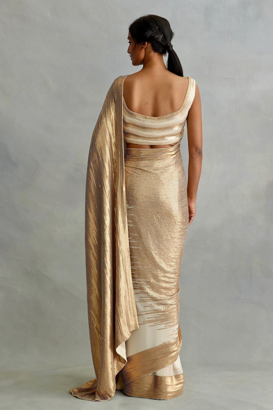 Sari in gold sequin sheeting embroidery