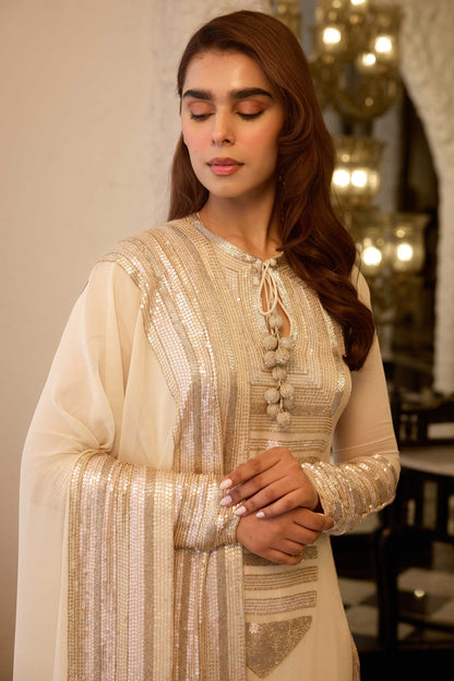 Kurta Set in yoke sheeted gold silver sequin embroidery